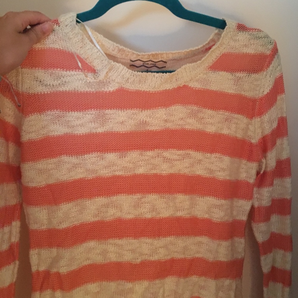 pink and white strip sweater